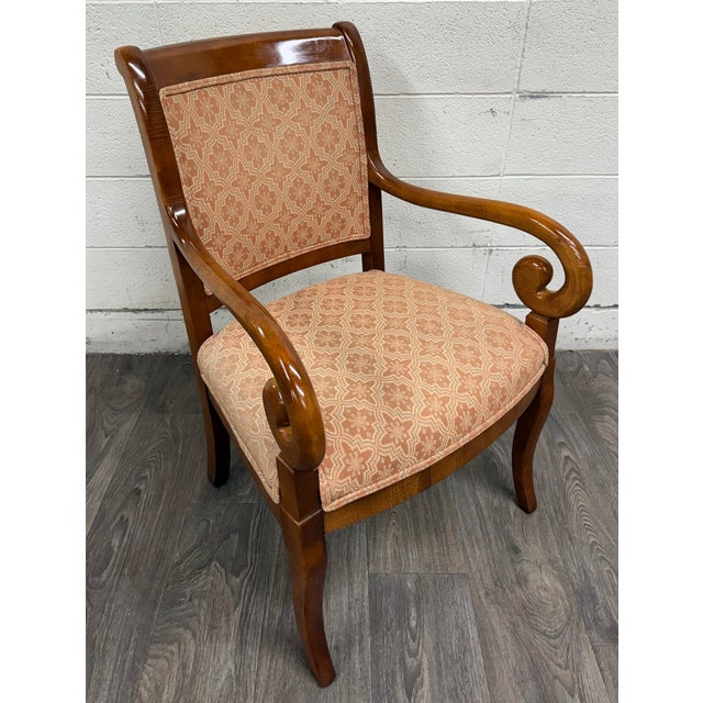 This is a vintage Hancock & Moore Jockey Club armchair featuring a sculptural hardwood frame, dramatic continuous scroll...