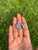 These elegant 4.02-carat pear-cut blue sapphire and diamond cluster stud earrings are crafted in 14K white gold. Each...