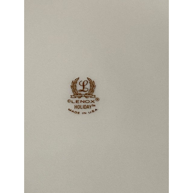 Lenox Vintage Holiday 10.75 inch Holly, Berries with Gold Trim Plate. “Lenox Holiday has become a mainstay of many...