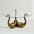 Stunning mid century coffee table in Maison Jansen style Imported by Rosenthal Netter. Three brass swans hold a 34" round...