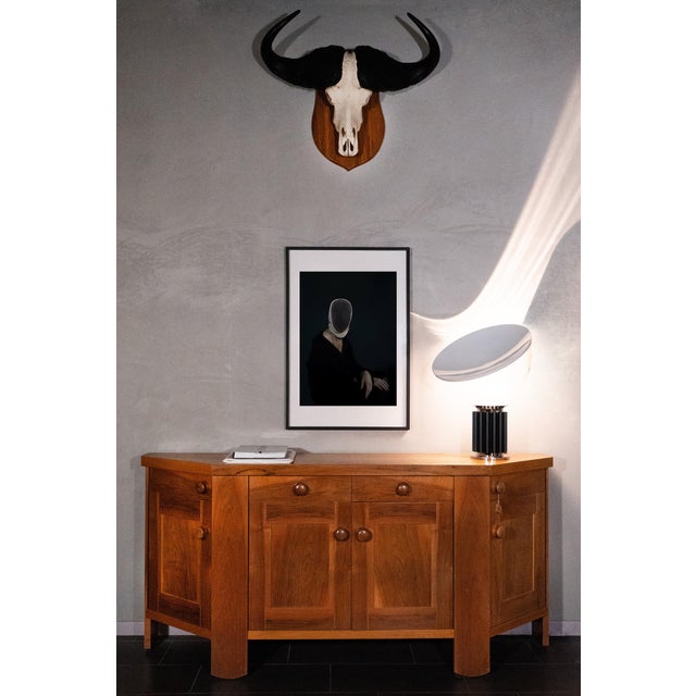 Walnut sideboard by Silvio Coppola for Bernini from the early 1970s. In good condition both inside and out, it has been...