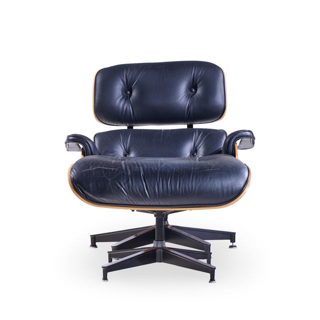 Charles and Ray Eames for Herman Miller Mid Century Eames Chair and Ottoman The chair measures: 33.5 wide x 34.5 deep x...
