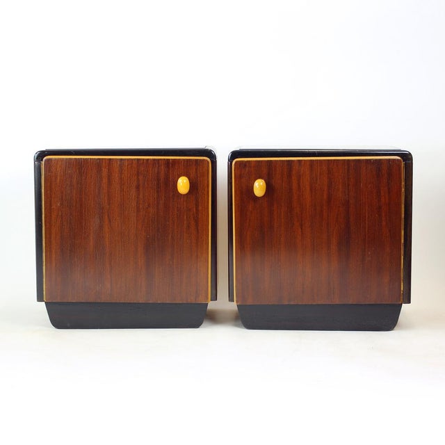 A striking and highly distinctive pair of bedside tables from 1960s Czechoslovakia, embodying the bold character of mid-...