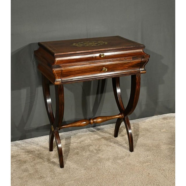 This wooden middle worker, stamped by the famous Roll* house located at No. 42 Faubourg Saint-Antoine in Paris, is an...