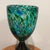 This Unique Table Lamp features a mottled art class shade with a sculpted base, adding a touch of vintage charm to any...