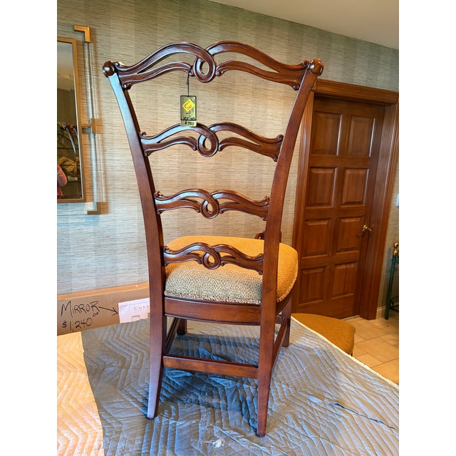 There are 4 Mahogany side chairs from Pulaski Furniture's Reproduction line. All chairs are carved with a horizontal...