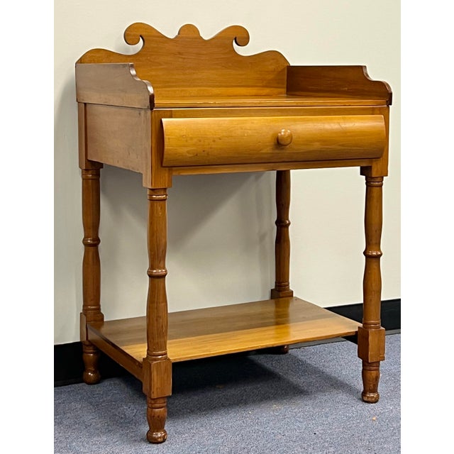 Charming antique 19th century washstand. Most likely made in Pennsylvania, and crafted of local tulip wood, also known as...