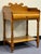 Charming antique 19th century washstand. Most likely made in Pennsylvania, and crafted of local tulip wood, also known as...