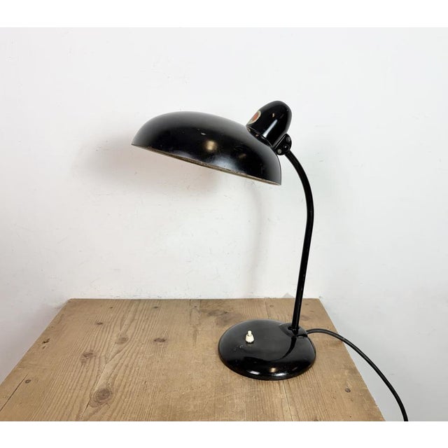This black Bauhaus industrial desk lamp with two adjustable joints was made by Rech Escolux in Germany during the 1930s....