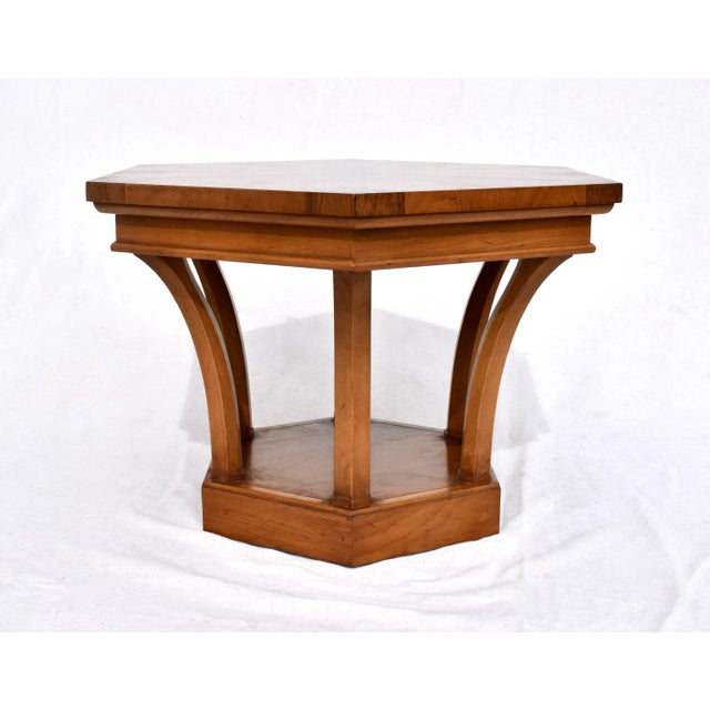 A 1960's side or end table by Tomlinson Furniture of fiery Pecan & Mahogany inlay woods in the Hexagon form. An unusual...