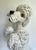 This delightful vintage Italian ceramic poodle sculpture features a playful expression, curly textured fur detailing, and...