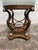 This is a fabulous center or dining table. Rattan woven metal base with ball and claw feet in brushed gold. Beveled glass...