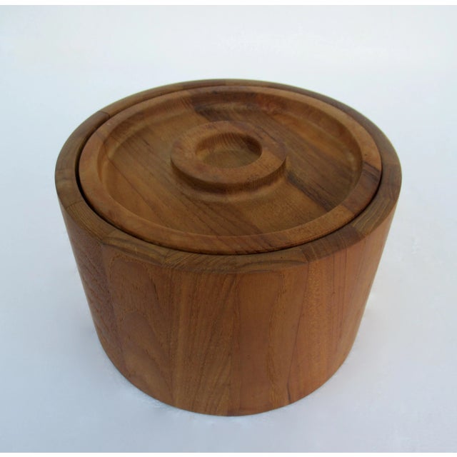 Vintage; 1960s-70s, Danish teak ice bucket designed by Jens Quistgaard for Dansk International. Ice bucket has a minimal,...