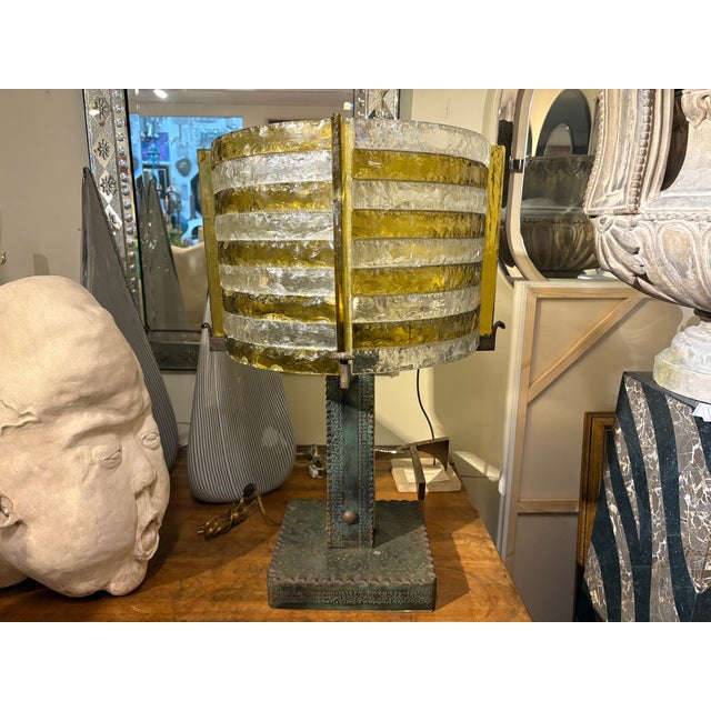 Italian Brutalist Iron And Glass Lamp By Longobord. We present a rare and unusual Italian Brutalist table lamp with a...