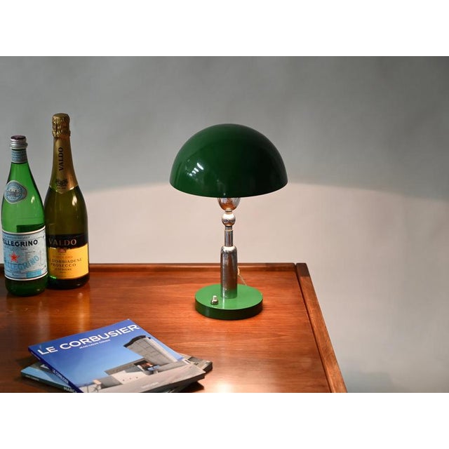 Unique Italian adjustable table lamp in chrome with a green enameled shade, inspired by the iconic design of the Bauhaus...