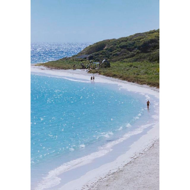 The Mill Reef Club by Toni Frissell Visitors stroll along the beach at the Mill Reef Club, Antigua, 1959. (Photo by Toni...