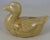 Antique French majolica yellow duck money bank, circa 1900.