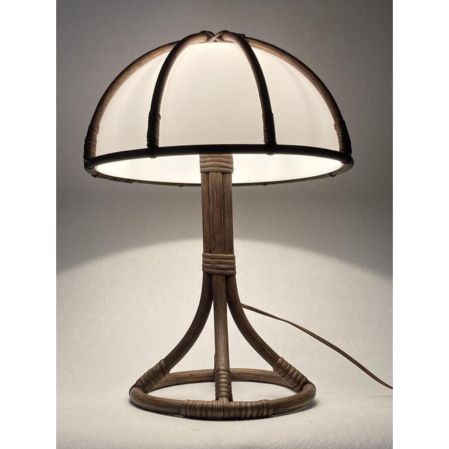 An unusual bamboo mushroom table lamp with acrylic shade, Dutch 1970s. The lamp is in great condition considering its age...