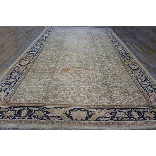 A magnificent and rare palace-sized Antique Persian Malayer carpet, circa 1880. Measuring 11' x 18' 2", this piece is...