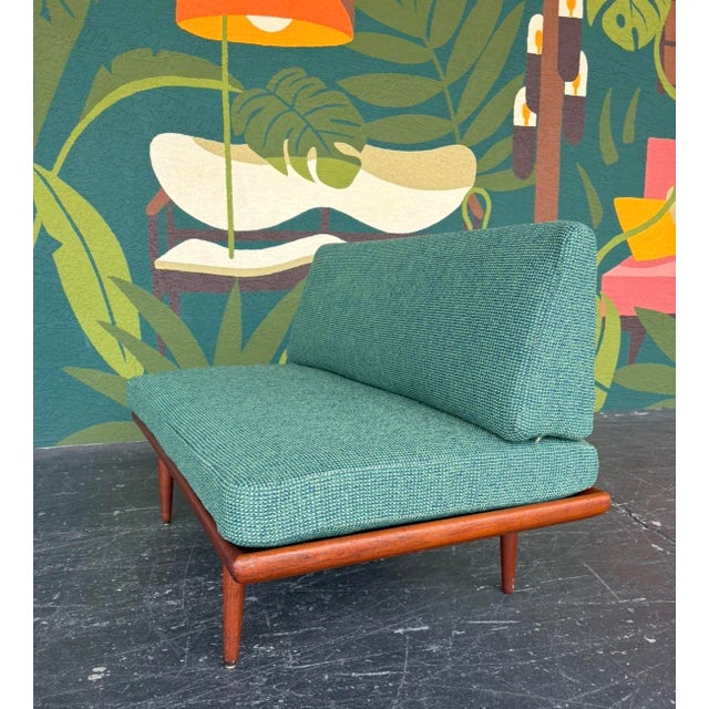Designed in the 1960s by Peter Hvidt and Orla Mørlgaard-Nielsen for France & Sons of Denmark, this sleek and streamlined...