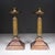 ABOUT A pair of vintage column candlestick holders. Each piece features a solid brass cylindrical column stem set upon a...