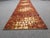 Colorful and very long flower power carpet from the 70s. The carpet is from the first owner and comes from a holiday home....
