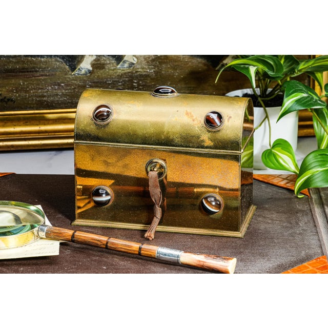 Exuding Victorian elegance and masterful craftsmanship, this Aesthetic Movement stationery box, circa 1880, is a stunning...