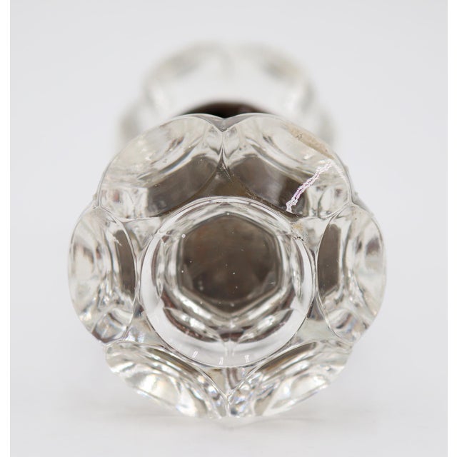 Hexagon shaped punted clear glass door knobs with a wide brass shank. Good condition with appropriate wear from age....