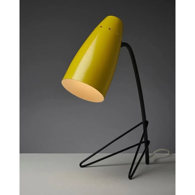 The Yellow Grasshopper is a playful and eye-catching table lamp that features a unique and distinctive design. The metal...