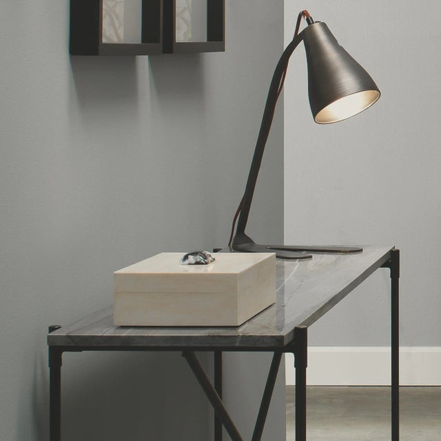 This sophisticated box in clean, cream resin is delicately accented with the perfect horn accent. This refined design...