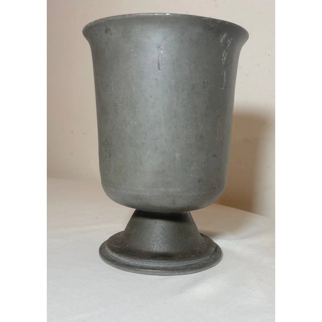 Up for sale is a rare antique 18th century handmade English pewter footed vase. It's made by hand out of thick pewter into...