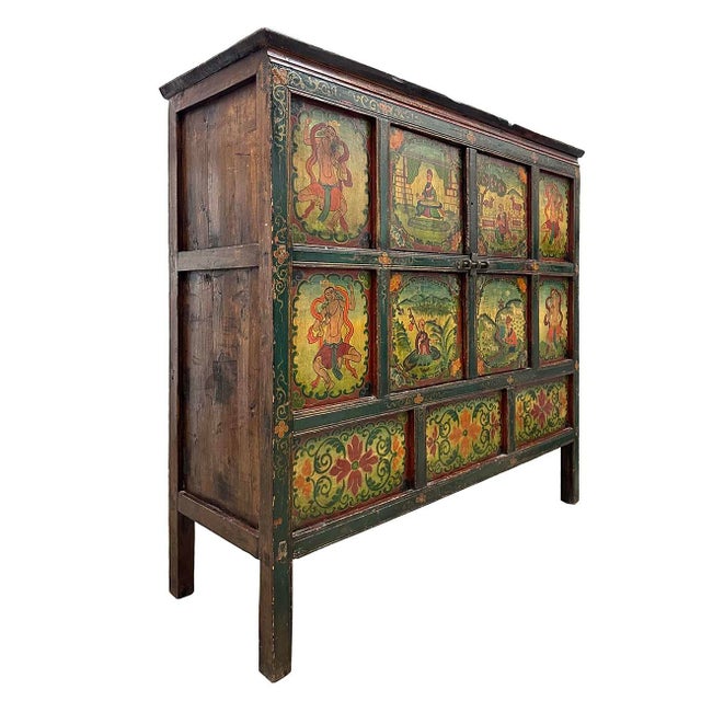 This Antique Tibetan Painted Cabinet is 100% hand made and hand painted using mineral painting which last the paint a much...