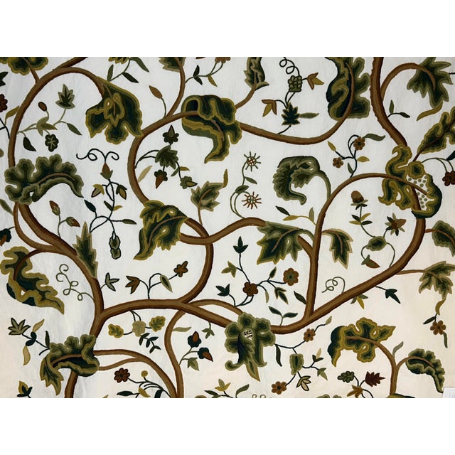 A dramatic flowering branch in shades of greens, tans & browns on an off-white cotton. Fine for upholstery or pillows due...