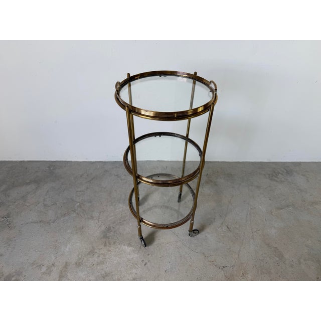 Hollywood Regency 1970’s Maison Jansen Style Italian Hollywood Regency Brass & Glass Three-Tier Rolling Bar Cart With Removable Trays For Sale - Image 3 of 12