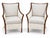 A striking pair of McGuire style rattan armchairs, distinguished by their sculptural rattan frames. The rattan frames have...