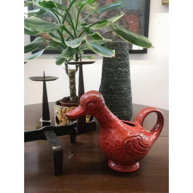 Duck-shaped ceramic bowl with red glaze, from the 1970s. Available in good condition.