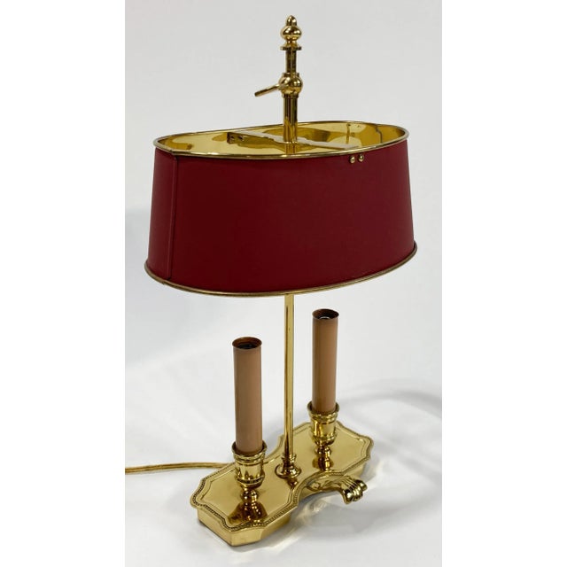 Vintage French style brass and tole Bouillotte candlestick lamp. Lovely design details to brass frame. Shade features...