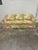 This is the sweetest sofa! Superb condition. Large floral quilted pattern. Super comfy. No maker name.