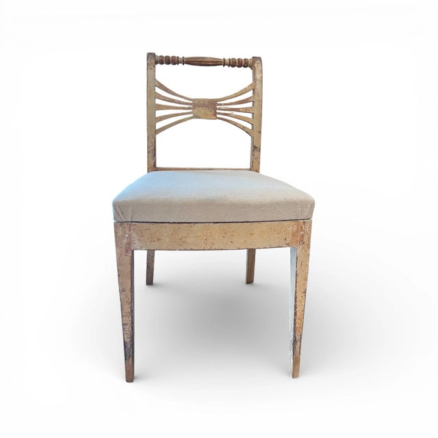 A 19th-century Swedish antique set of chairs, featuring simple, elegant lines and traditional craftsmanship. Made from...