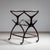 Bar trolley on castors designed by Cesare Lacca. This elegant piece features a top shelf with a glass base and brass...