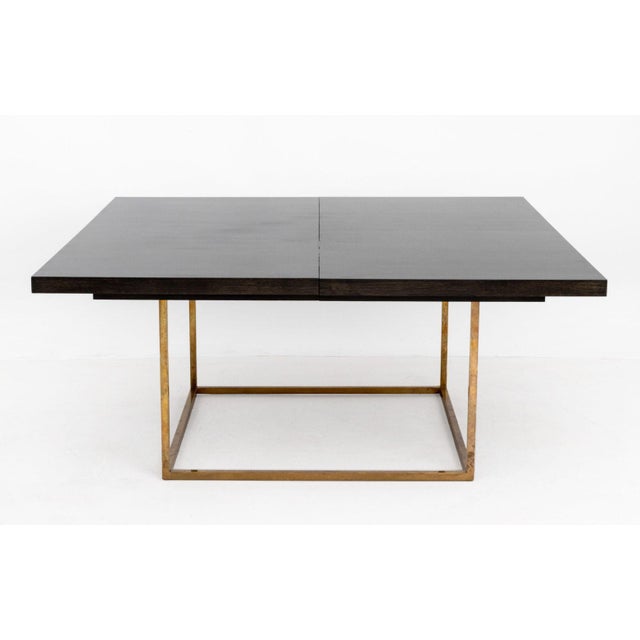 Mid-Century Modern Style Extending Dining Table, with brass base, wood top, and an extension leaf. 29.5" H x 66" W x 66"...