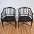 This is a glamorous pair of black and gold painted faux bamboo arm chairs. The chairs are missing the makers mark, but...
