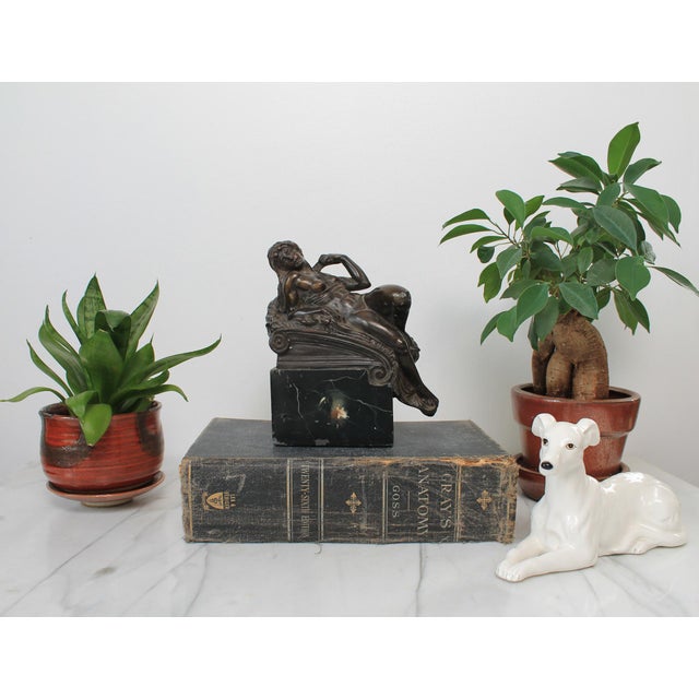Vintage female figure bookend sculpture. No makers mark. Overall age wear.