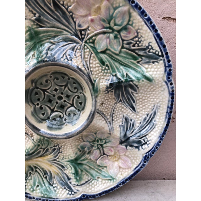 Belgium Majolica oyster plate with pink flowers and green leaves Wasmuel, circa 1890.