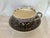 An extra large Copeland Spode cup and saucer in the Greek pattern. The cup and saucer feature a distinct brown transfer...