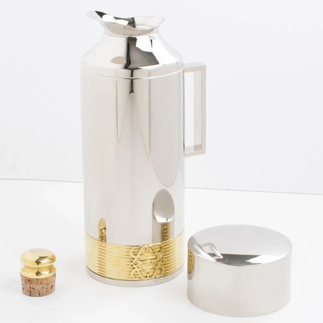 A luxury gilded brass and chromed metal barware bar thermos or insulated decanter, carafe by Loewe, Spain. Sleek and...