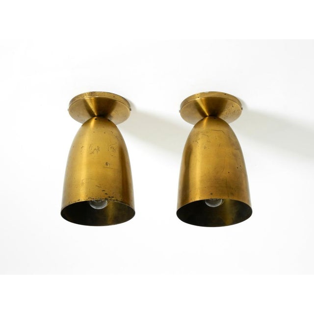 Two beautiful, rare, large, original Mid-Century Modern brass ceiling lamps. Large shade and canopy with mounting...