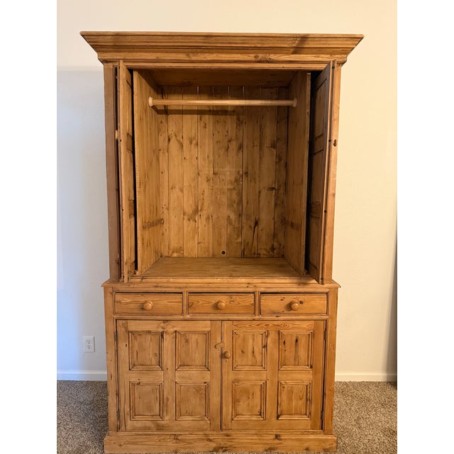Timeless and substantial, this solid pine armoire captures the quiet luxury of European craftsmanship. Paneled doors,...