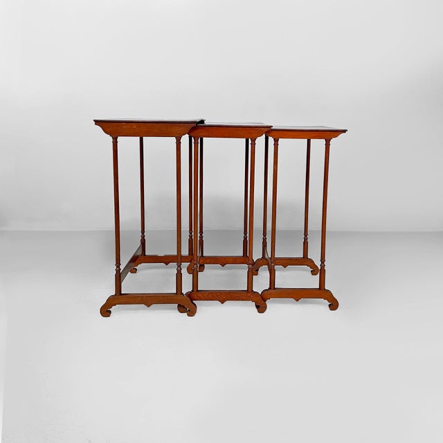 Italian wooden coffee tables, second half of the 19th century Set of three coffee tables, all made entirely of wood. The...