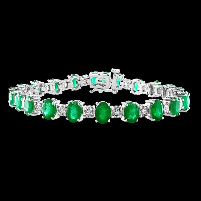 This exceptionally affordable Tennis bracelet has 24 stones of oval Emeralds . Each Emerald is spaced by a single small...